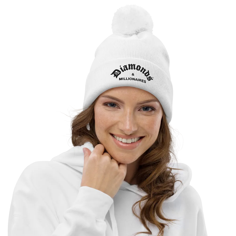 DIAMONDS & MILLIONAIRES POM POM BEANIE