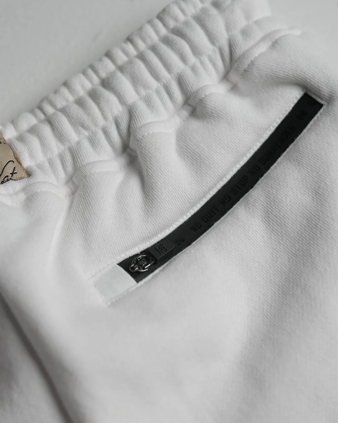 EMBOSSED FITTED JOGGERS-WHITE