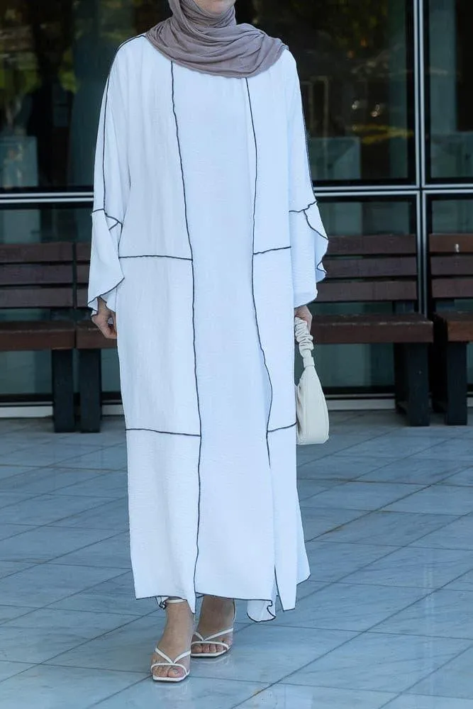 Noraa three piece maxi abaya in white with contrast black piping