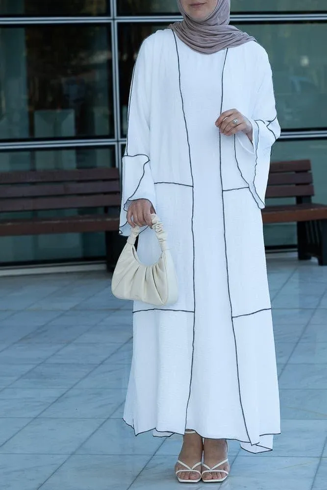 Noraa three piece maxi abaya in white with contrast black piping