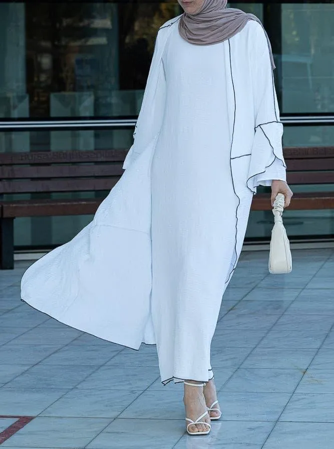 Noraa three piece maxi abaya in white with contrast black piping