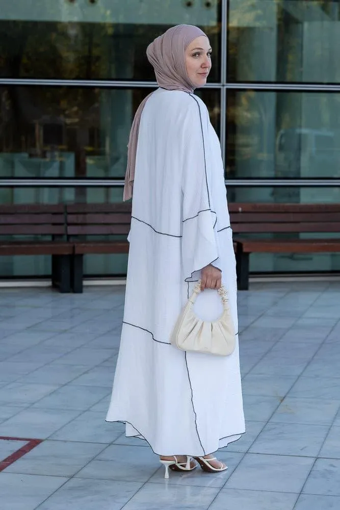 Noraa three piece maxi abaya in white with contrast black piping